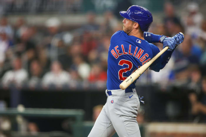 Sep 26, 2023; Atlanta, Georgia, USA; Chicago Cubs first baseman Cody Bellinger (24) hits a single against the Atlanta Braves in the second inning at Truist Park.